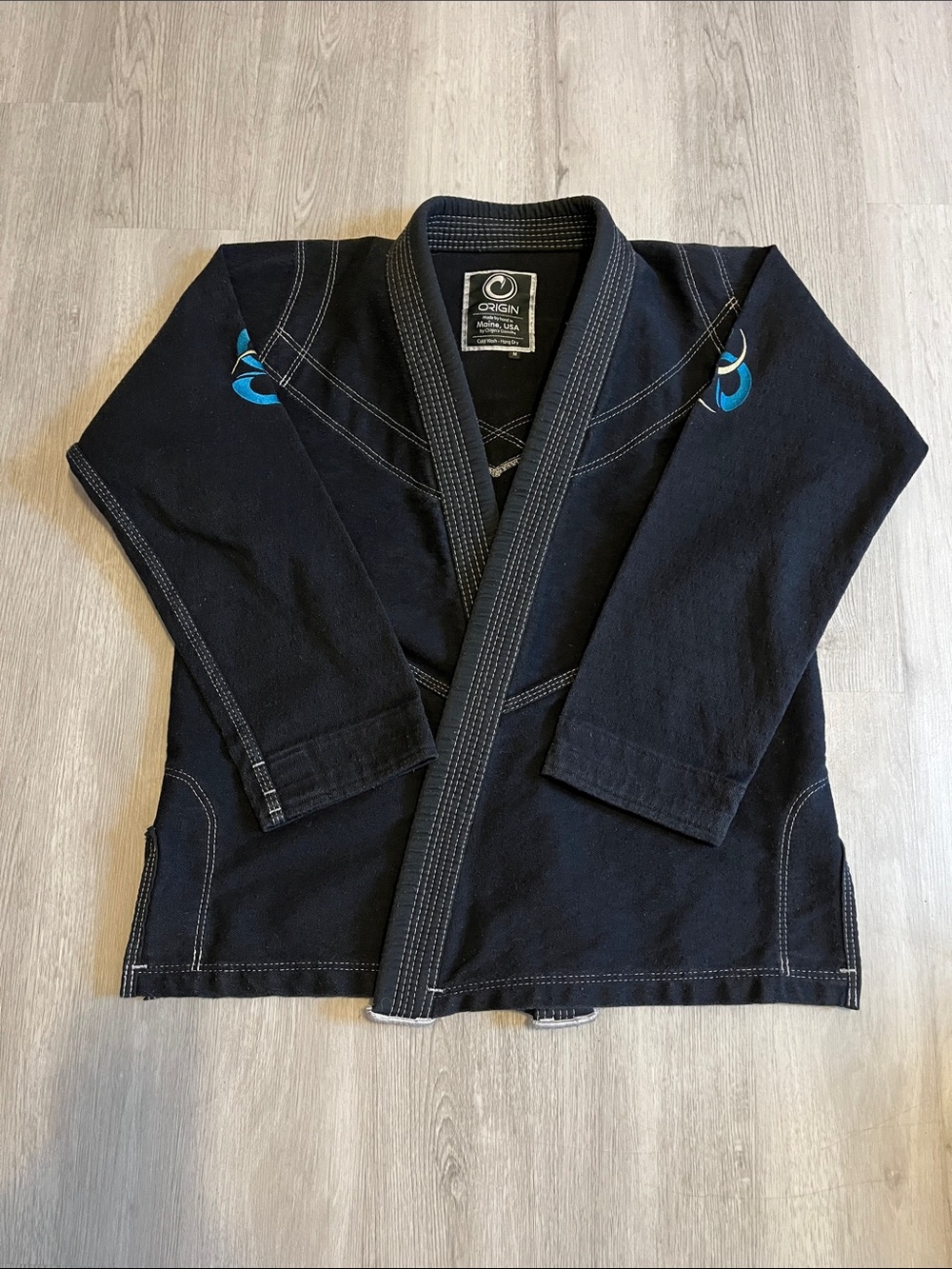 Origins Black Martial Arts Jacket with Teal Accents